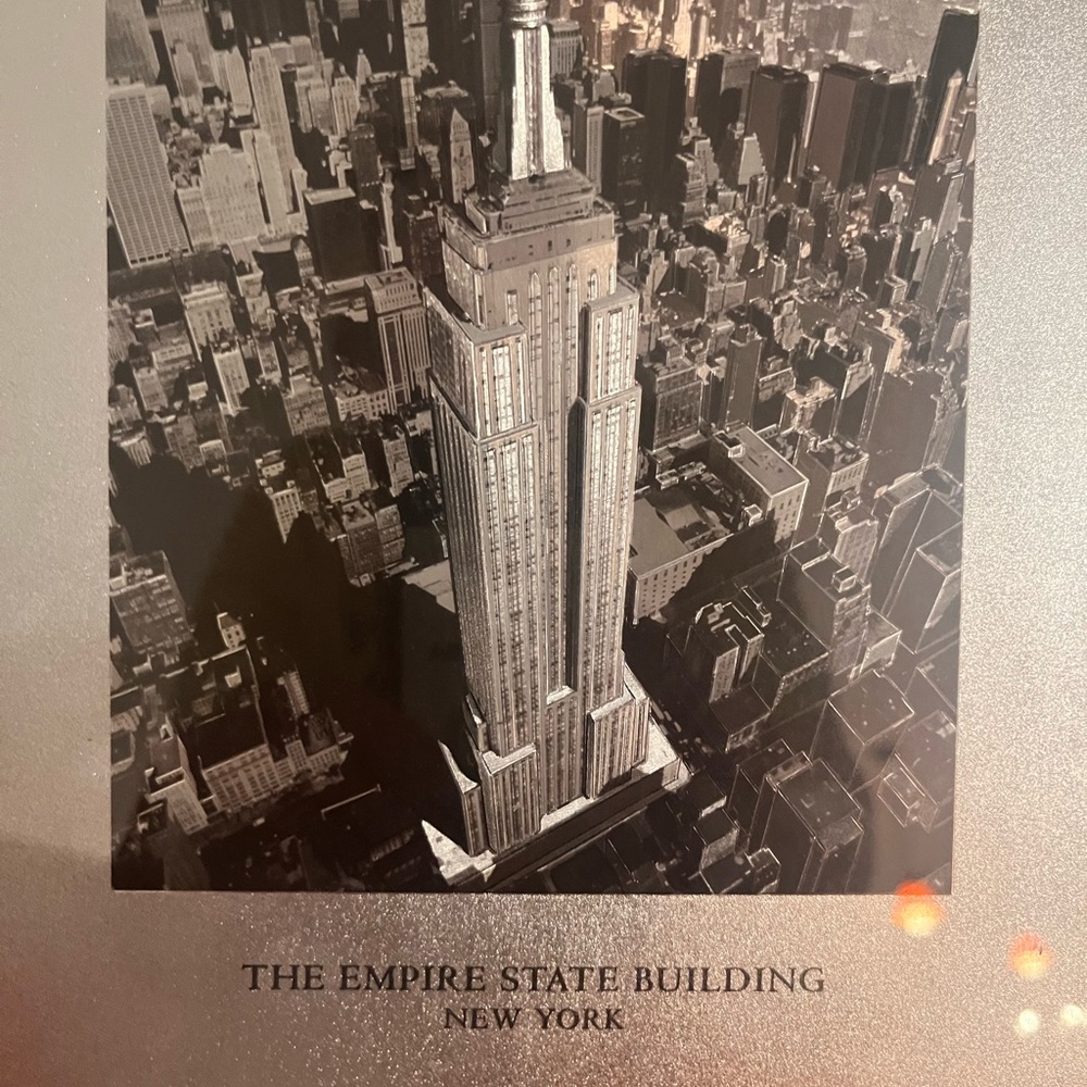 Empire State building NYC beautifully framed in black.